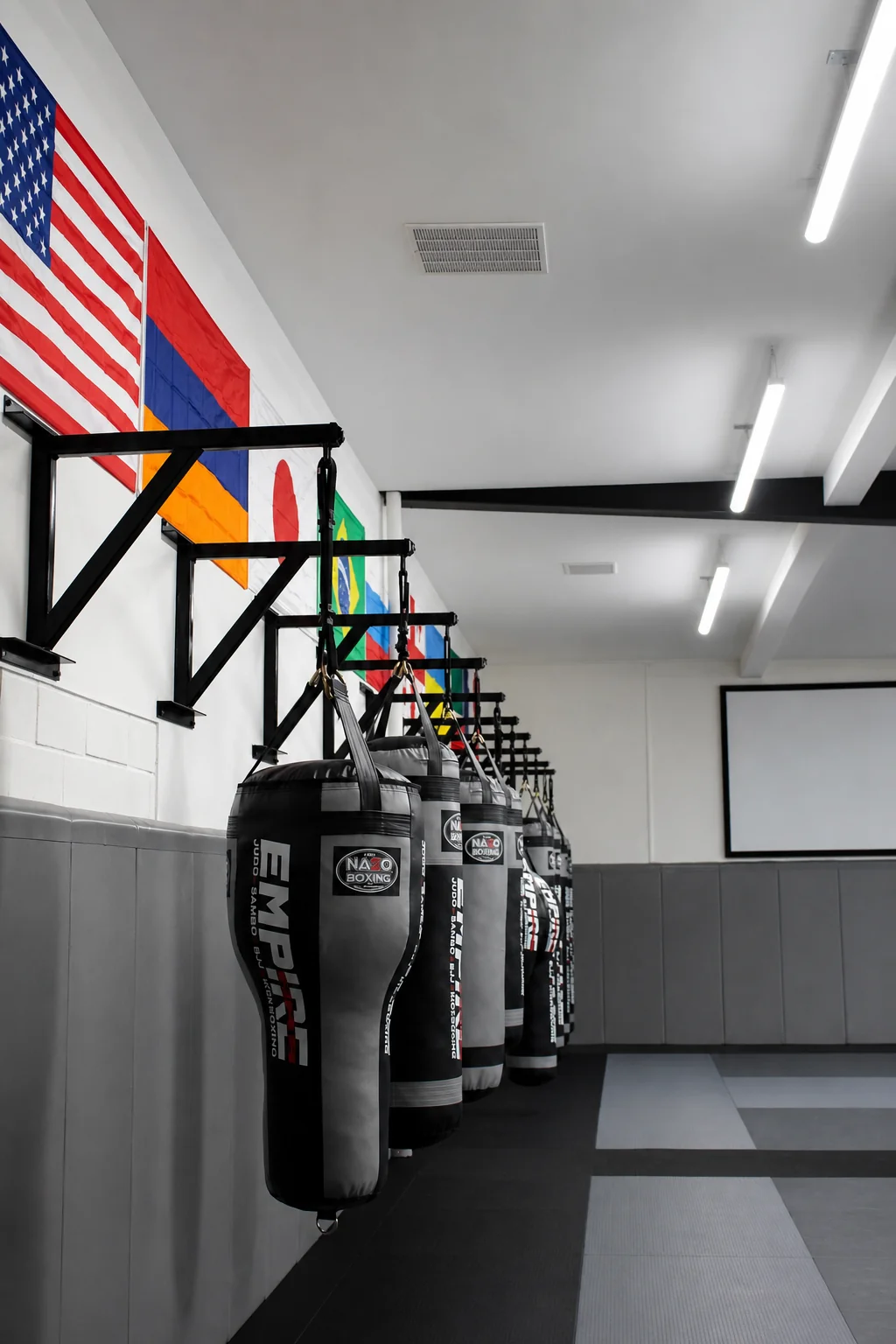 Empire MMA fighter resting between rounds in a darkened gym